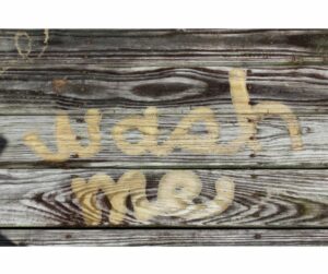 Wash Me Written On Wooden Deck Show It Needs Cleaning